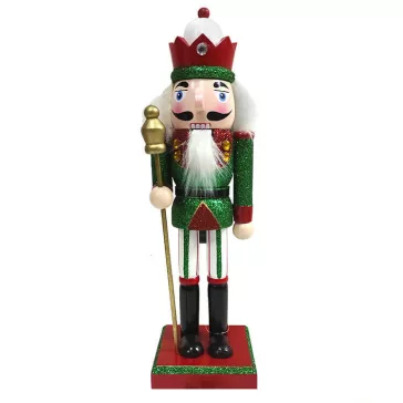   Diótörő (zöld színű ruhában sárga kő díszítéssel és fehér-piros kalappal)