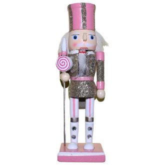   Diótörő 38 cm-es, aranyozott, csillámos ruhában , rózsaszín kalapban